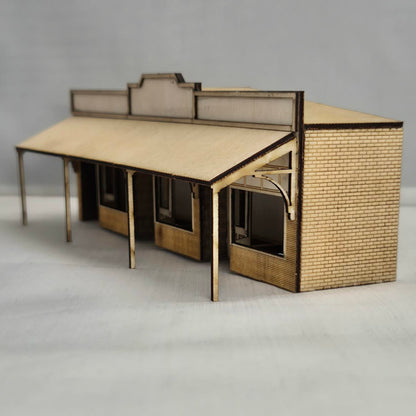 SM1043L - Laser Cut "Low Relief The Shops" - HO Scale