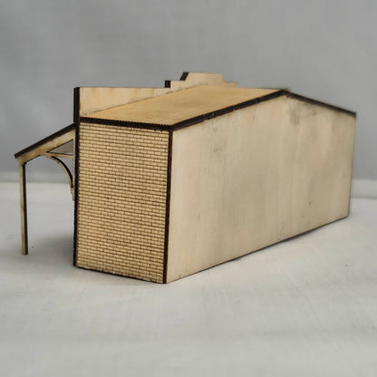 SM1043L - Laser Cut "Low Relief The Shops" - HO Scale