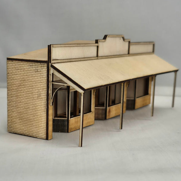SM1043L - Laser Cut "Low Relief The Shops" - HO Scale